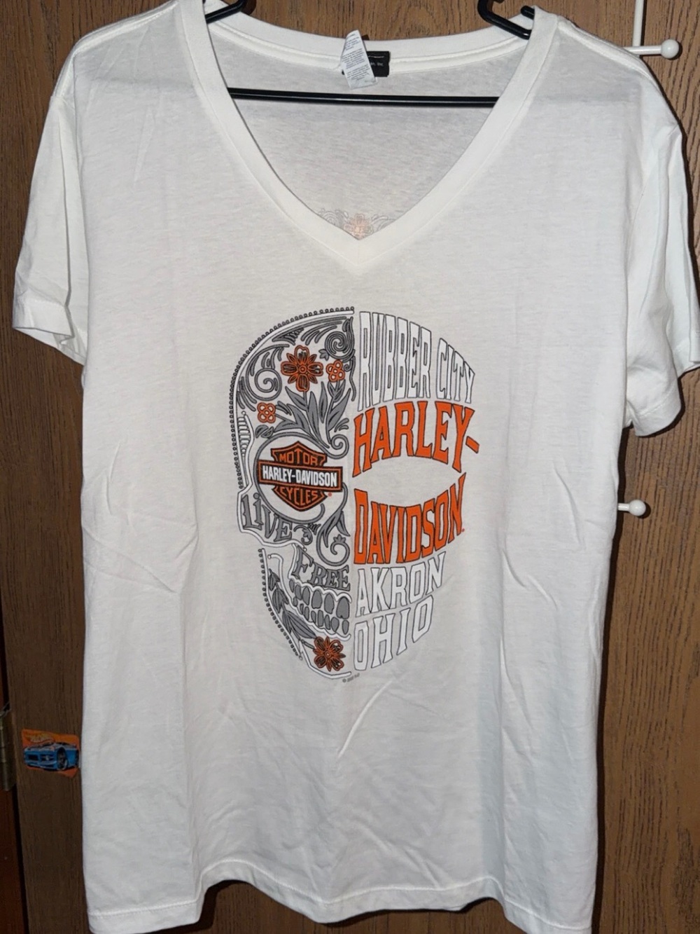 Harley-Davidson White V-Neck Skull Graphic Tee with Orange Accents